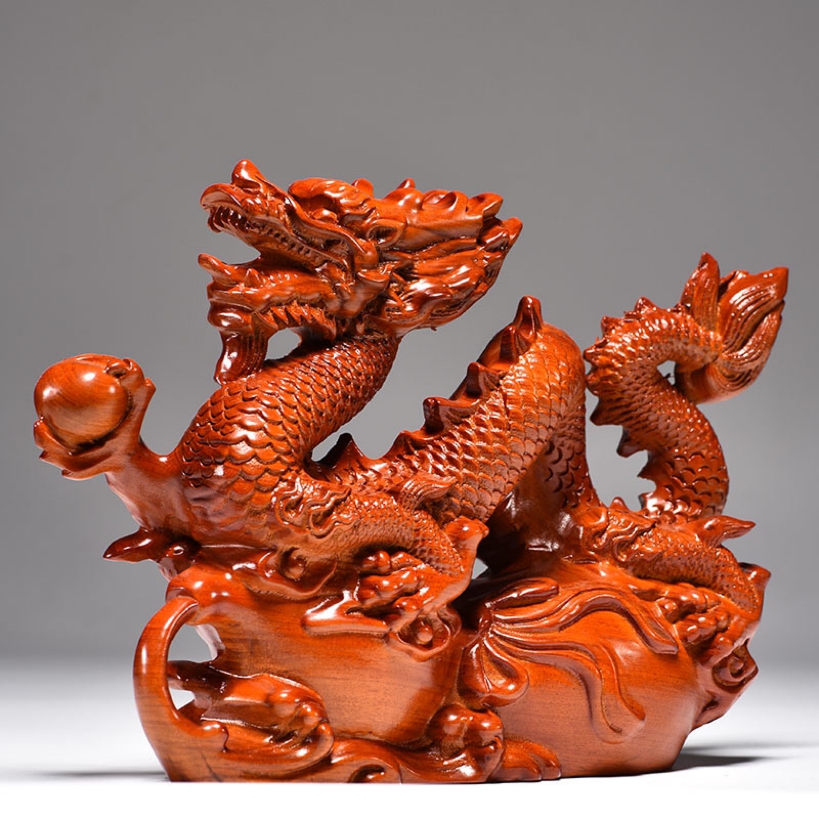 Carved wooden dragon ornaments