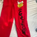 red grinch sweat pants