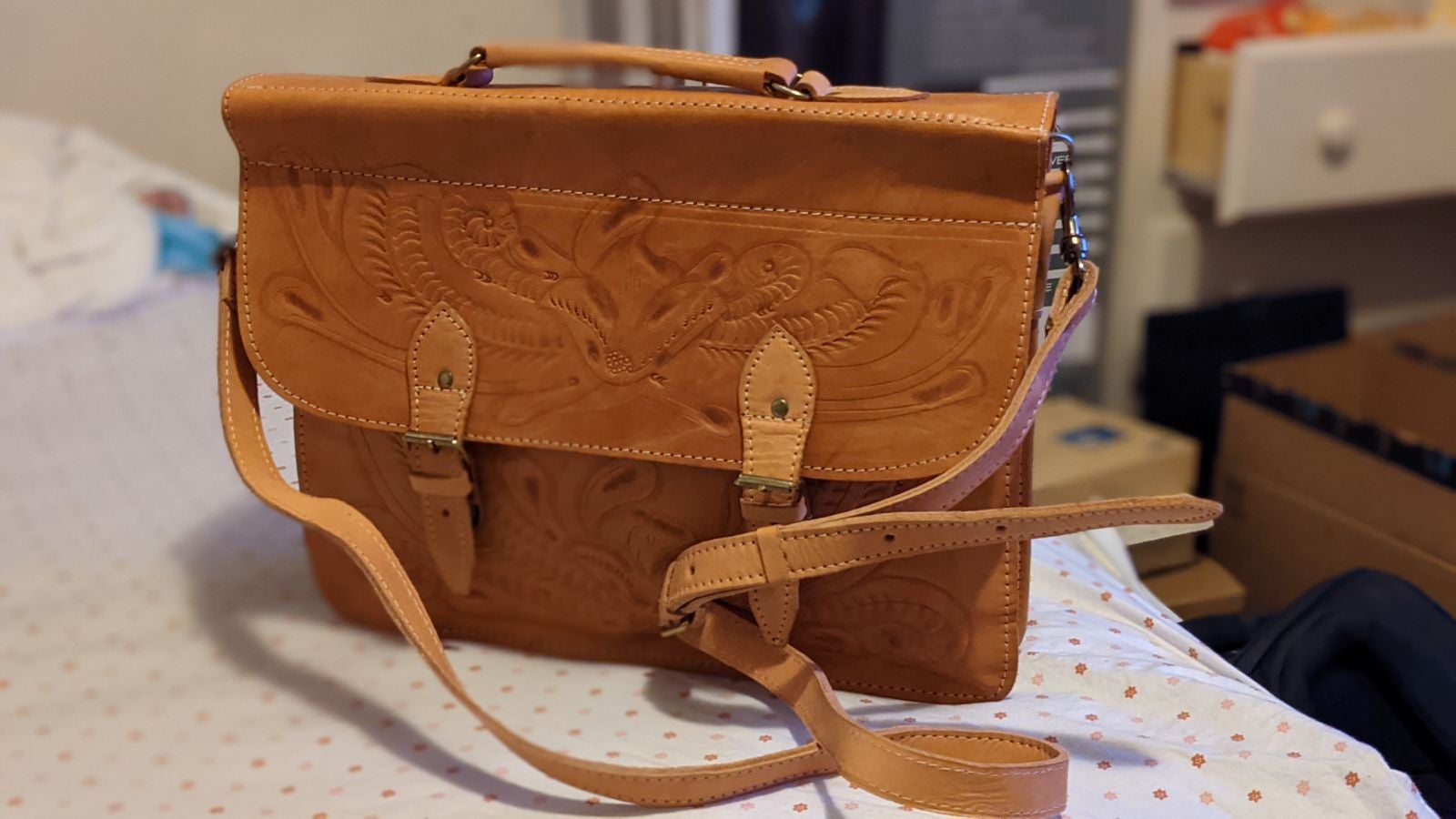 Brown designer saddle leather messenger