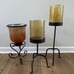 TRIO OF LARGE AMBER HURRICANE LAMPS WITH STANDS