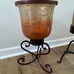 TRIO OF LARGE AMBER HURRICANE LAMPS WITH STANDS