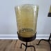 TRIO OF LARGE AMBER HURRICANE LAMPS WITH STANDS