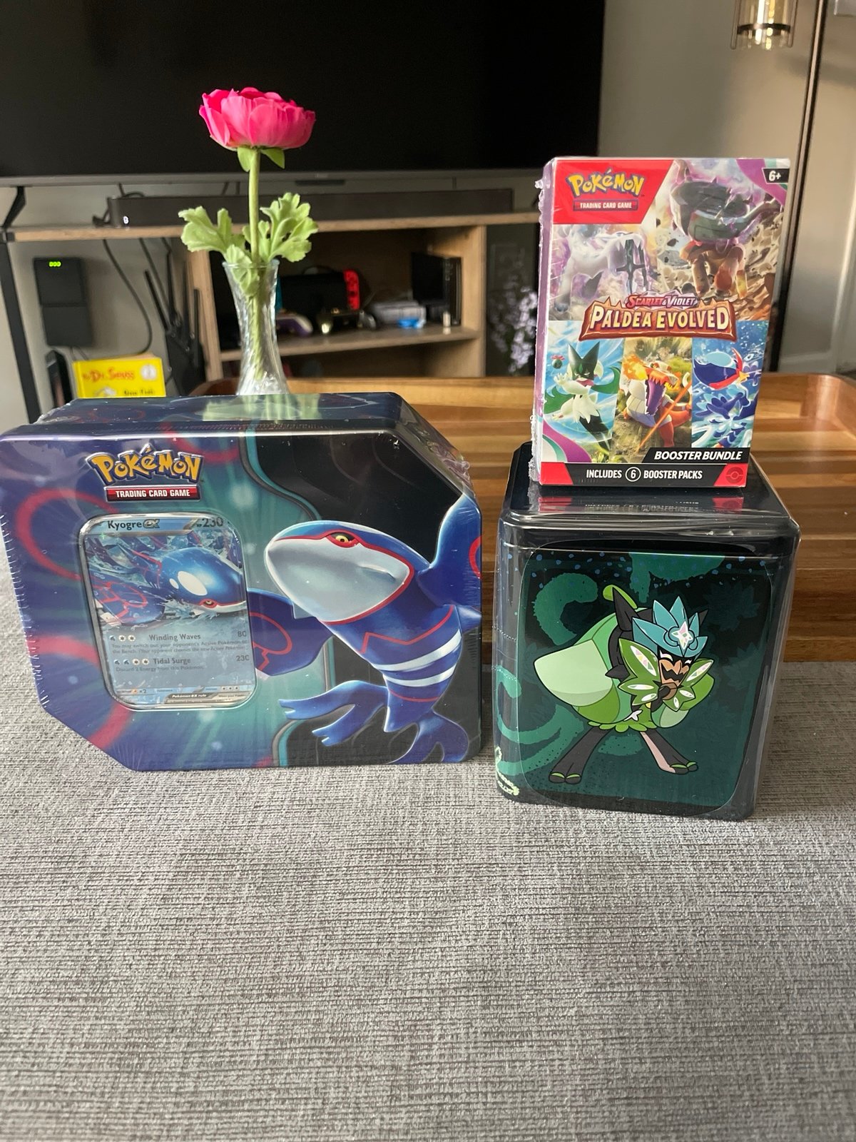 Pokemon Paldea Evolved Booster bundle and Kyogre and Ogerpon tins