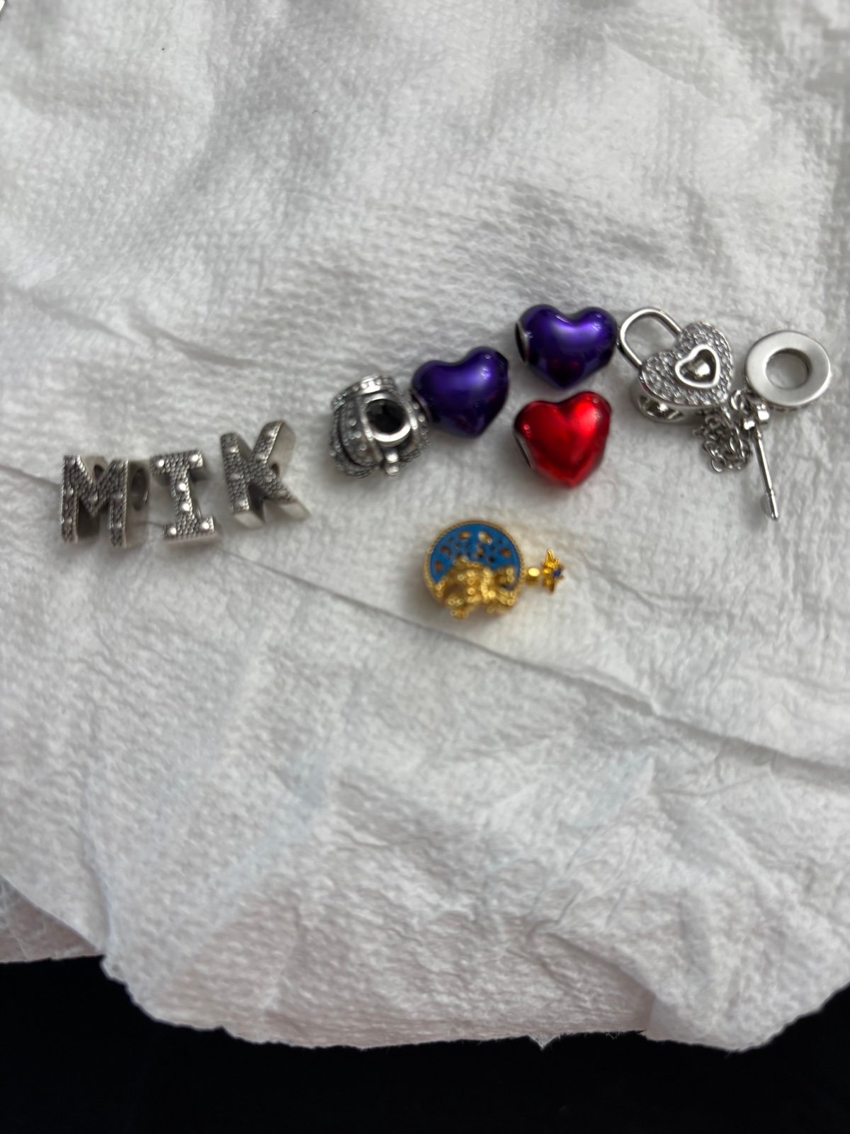 A mix of different cute and pretty charms. Not pandora.