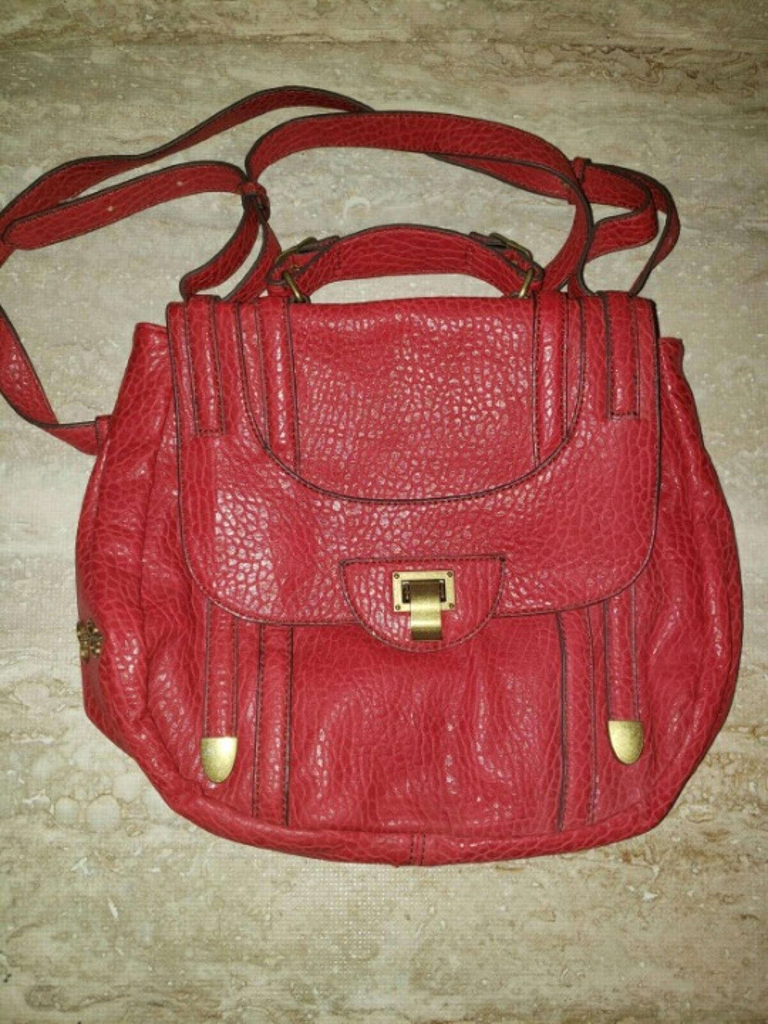 Jessica Simpson red crossbody purse satchel with buckle flap and inside zippers