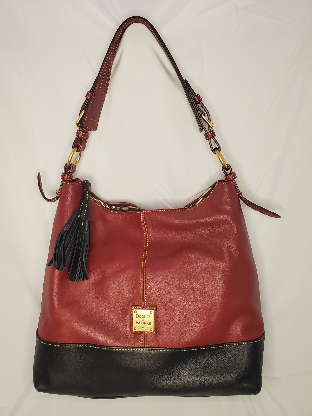 Cranberry and black Dooney and Bourke hobo