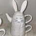 Whimsical cupboard three-piece bunny tea set