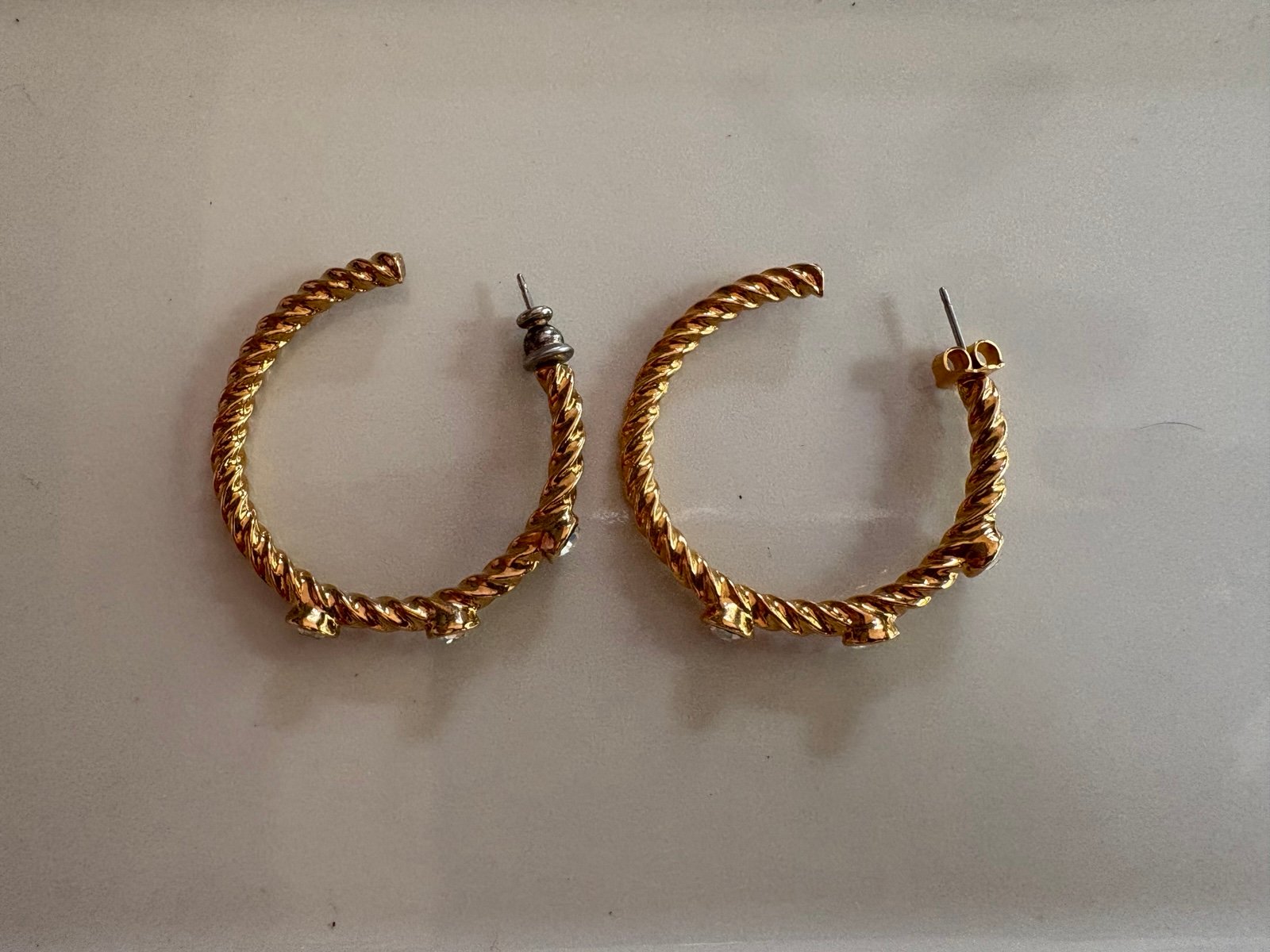 Twisted Gold Hoop Earrings with Diamonds