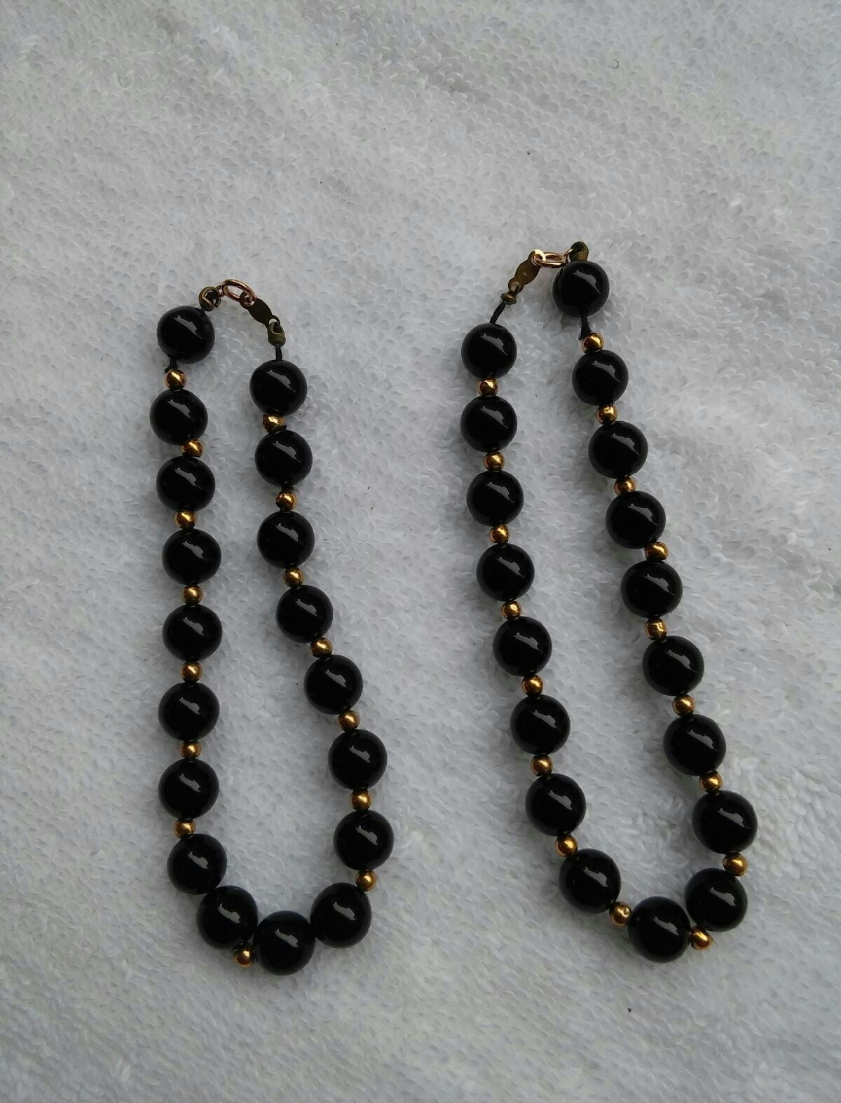 Two simply special Onyx & Gold bracelets