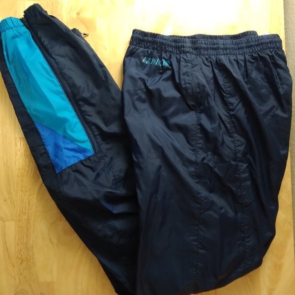 Vintage Nike Spell Out Mesh Lined Wind Pants Joggers Trainers