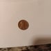 1964 no mint penny with DD around the rim and date the 1st number is smaller