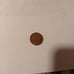 1964 no mint penny with DD around the rim and date the 1st number is smaller