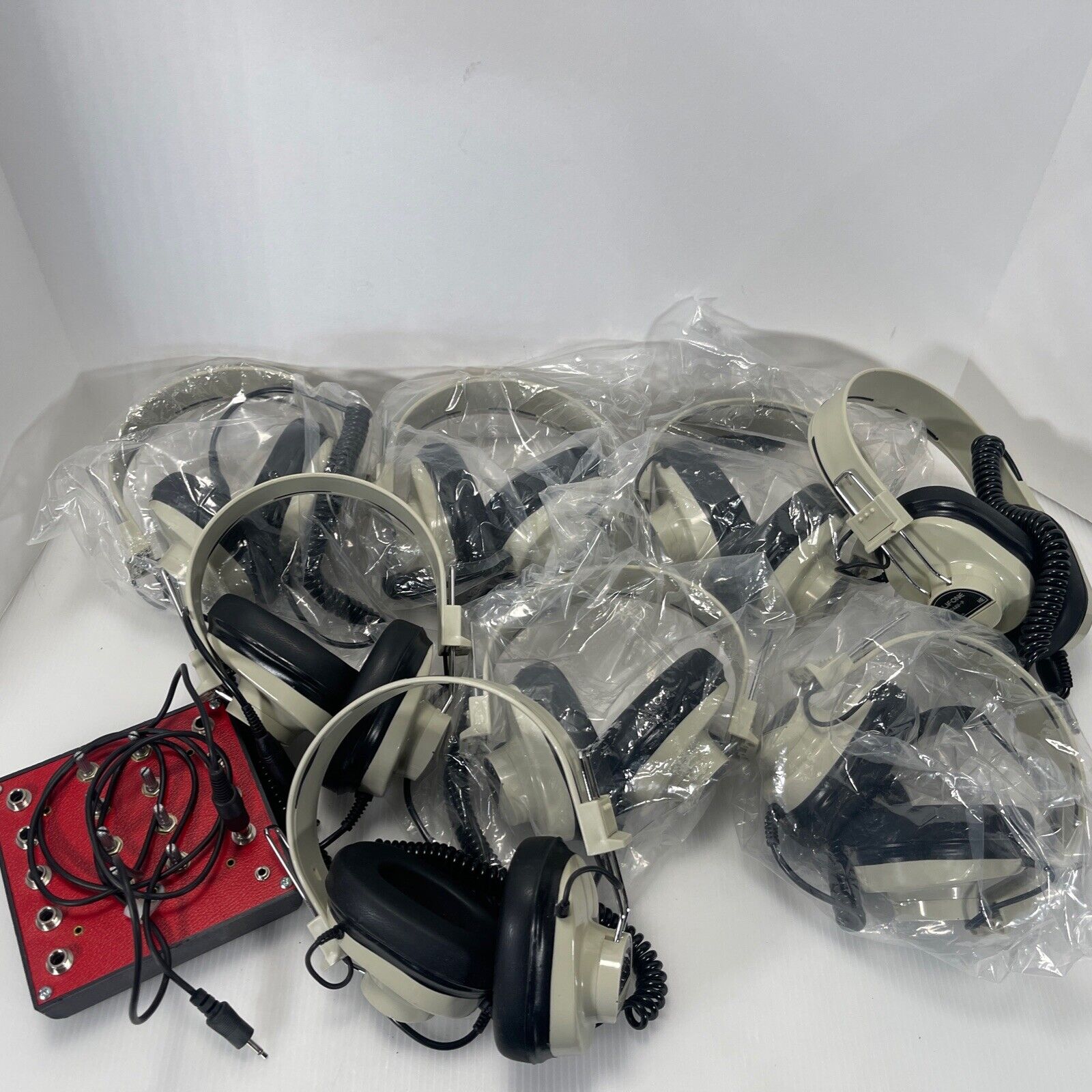 Lot of 8 Califone 2924AV-P, Mono Headphones, Fixed Coiled Cord New W/ Plugin Box