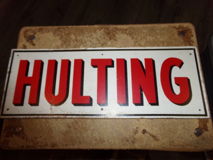 vintage 24 x 9 masonite hulting hybrids seed sign in good shape used