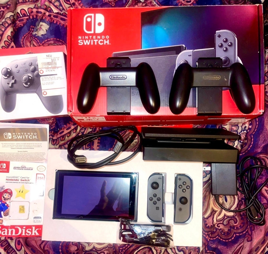 Nintendo Switch, Like new and in original box, with added accessories