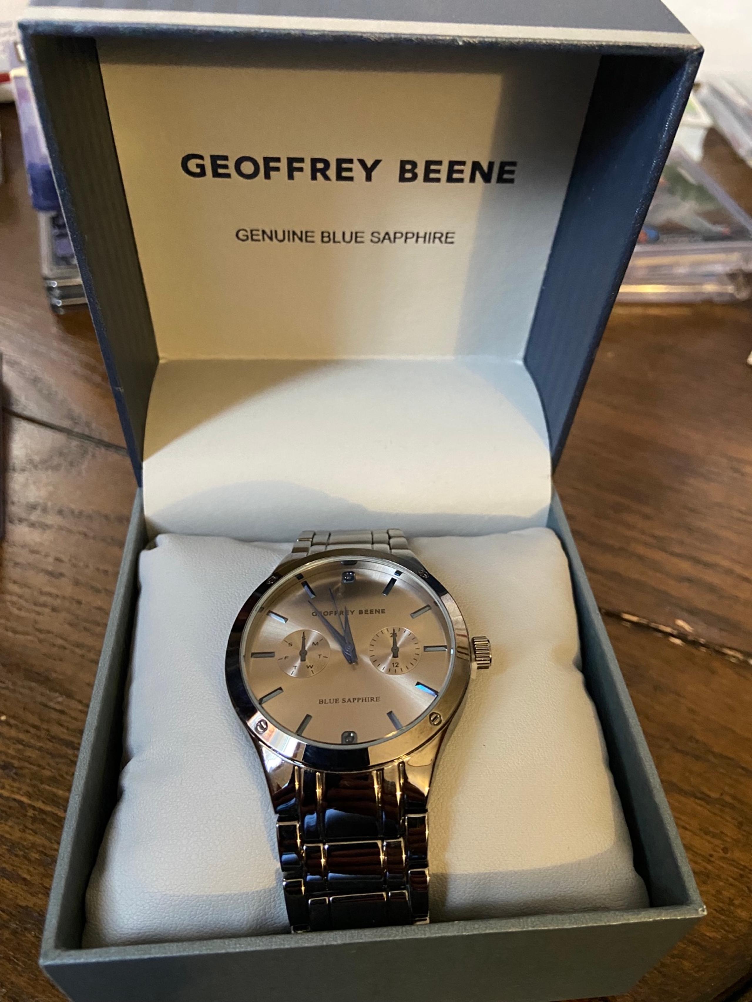 NIB GEOFFREY BEENE GENUINE BLUE SAPPHIRE STEEL #GBB8216GU MENS WATCH