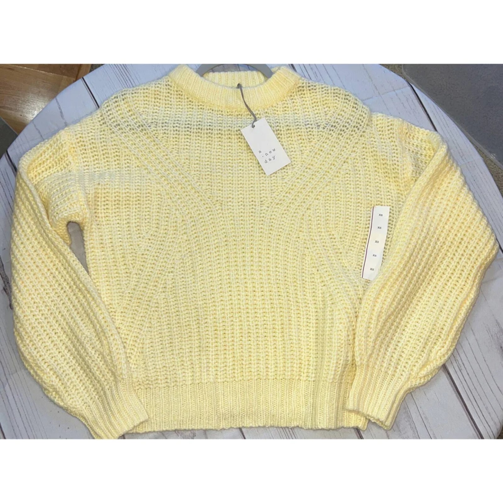 yellow sweater