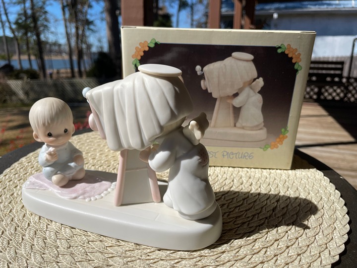 Precious Moments 1984 Figurine Baby's First Picture by Samuel J. Butcher