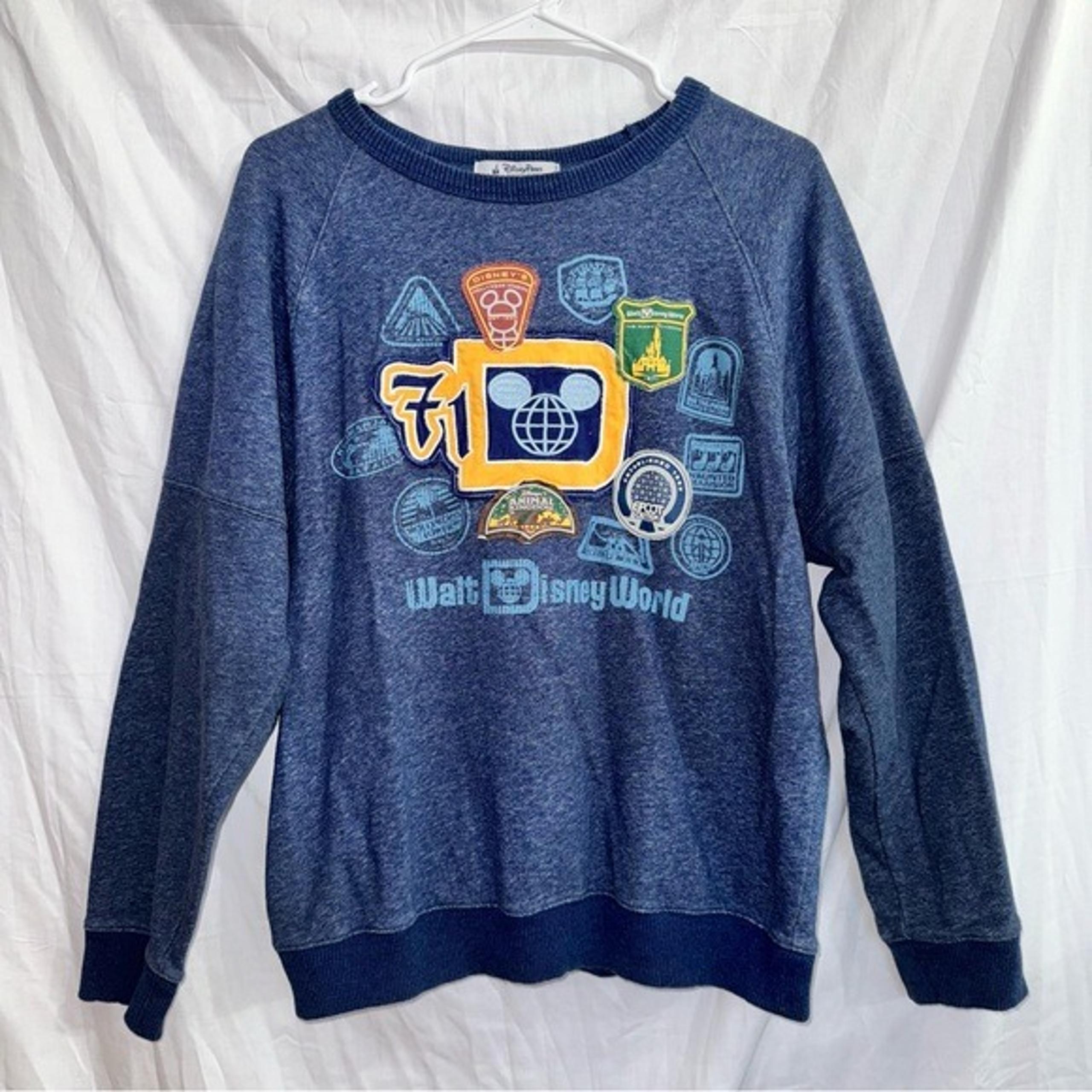 Disney Parks Authentic Originals Men’s Sweatshirt Multi Park & Ride Patch Theme