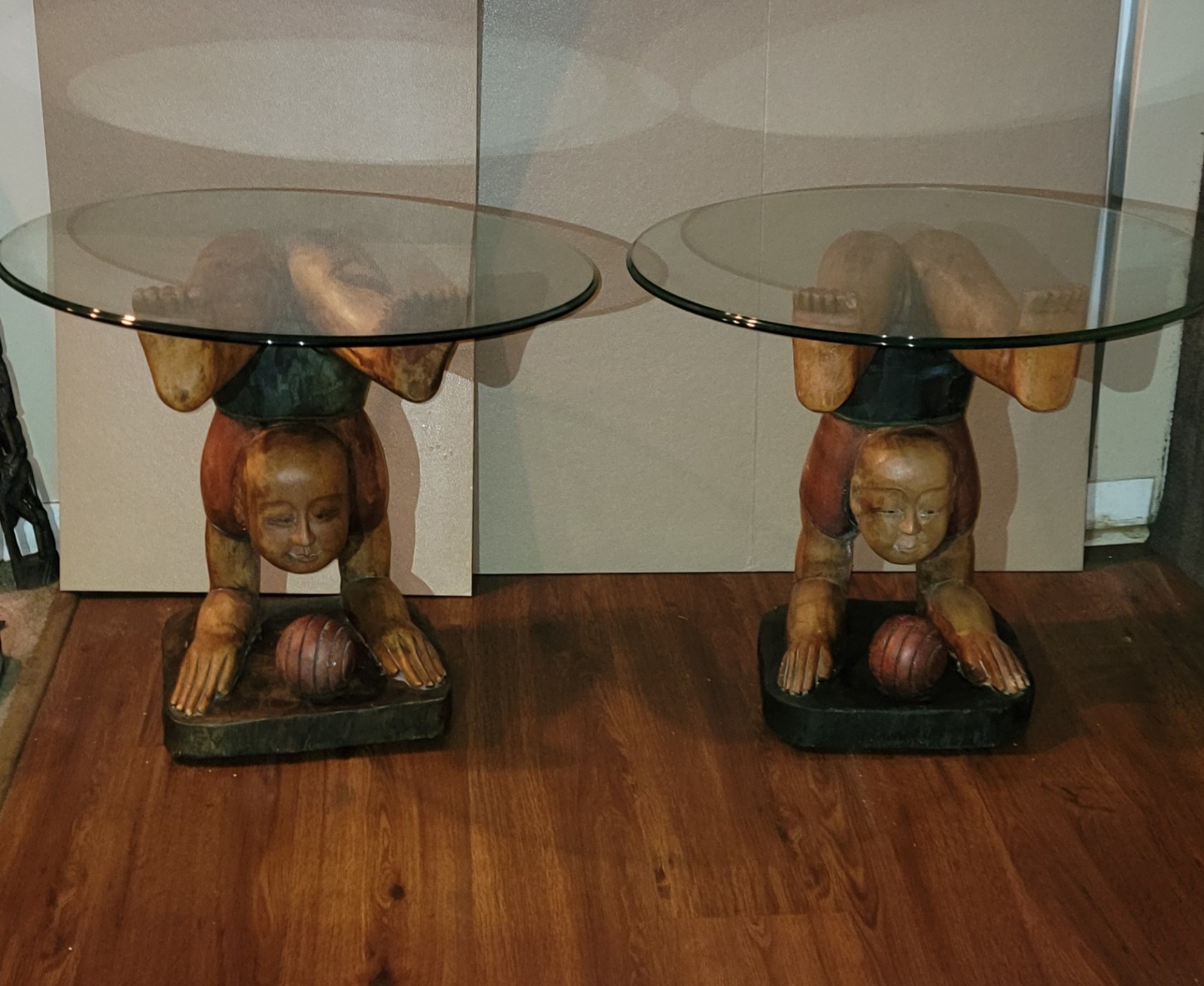 A PAIR OF VINTAGE WOODEN HANDCARVED 12X12X20 TABLES WITH GLASS TOPS