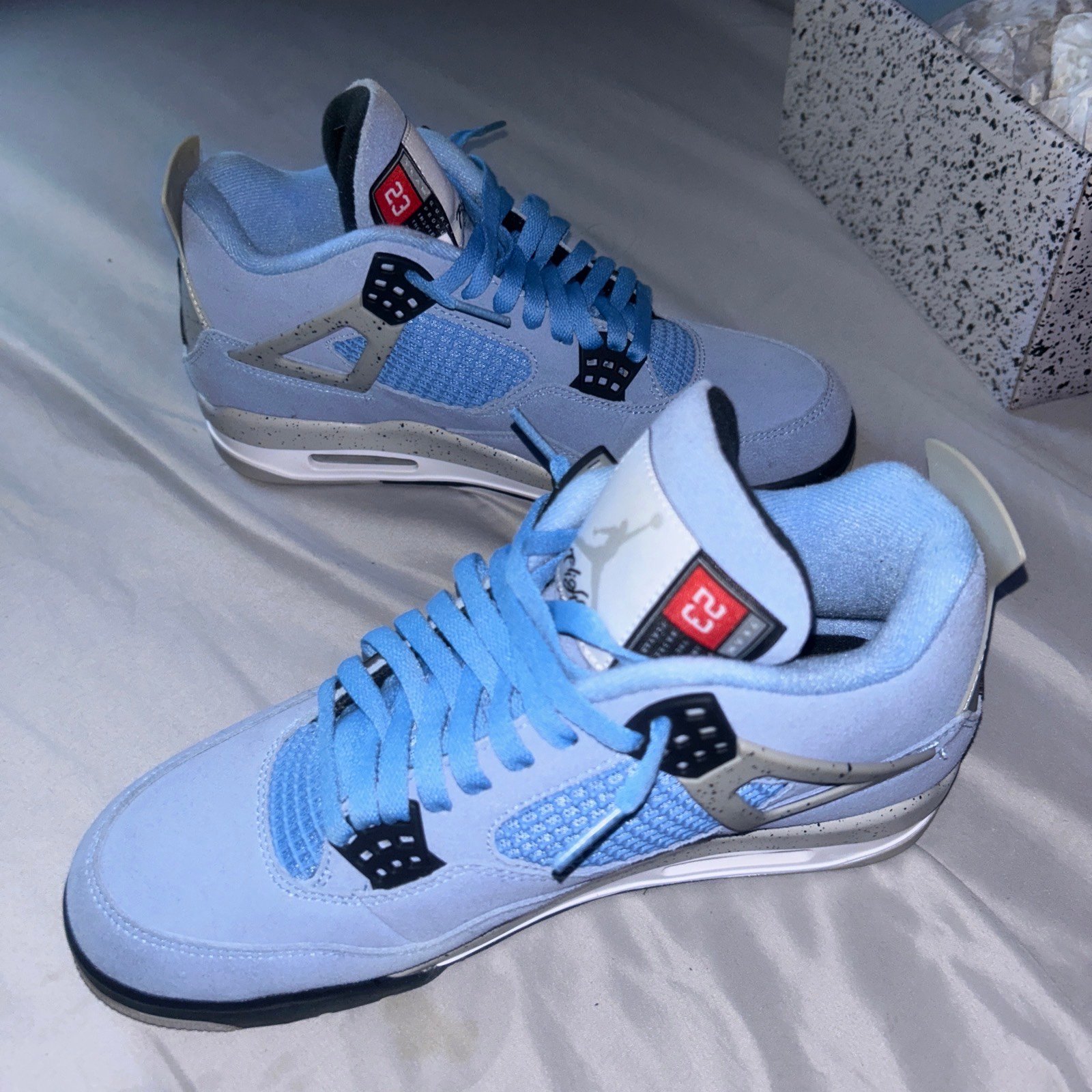 university blue Jordan 4