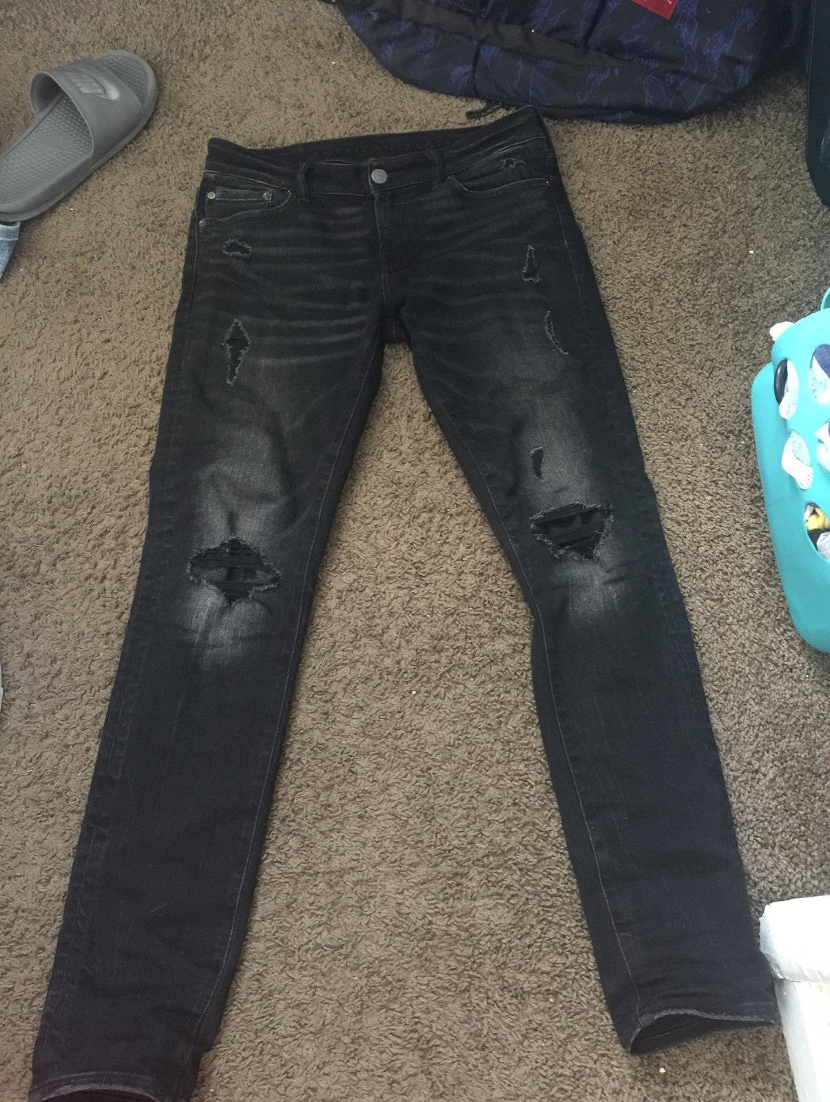 black ripped jeans