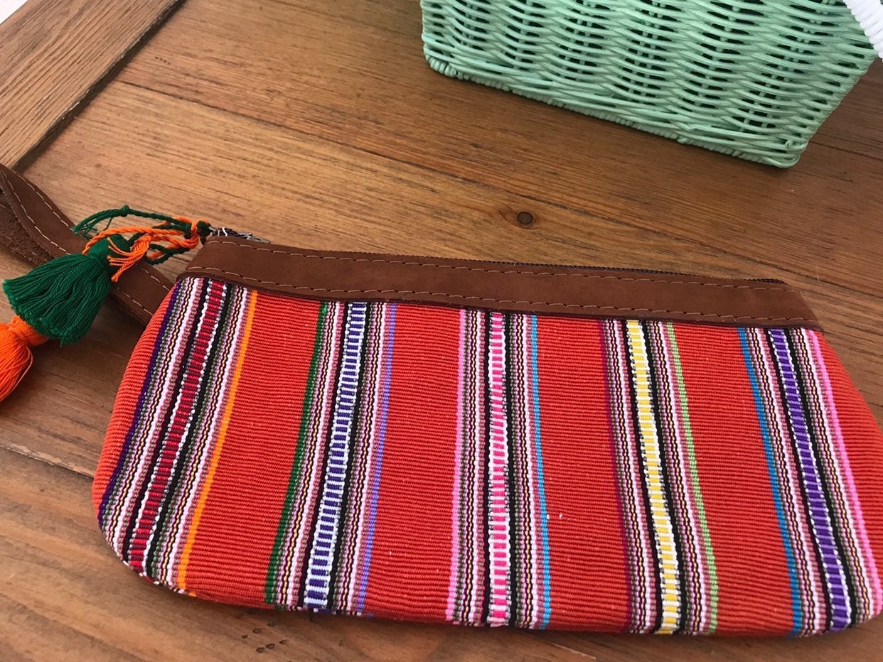 Nena and Co. orange clutch