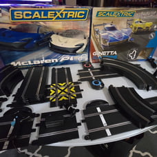 Two 1:32 scale Scalextric slot car track sets
