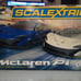 Two 1:32 scale Scalextric slot car track sets