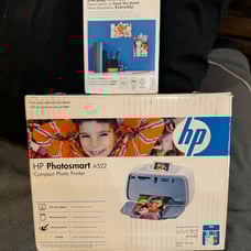 HP Photosmart A522 printer with picture paper. Used