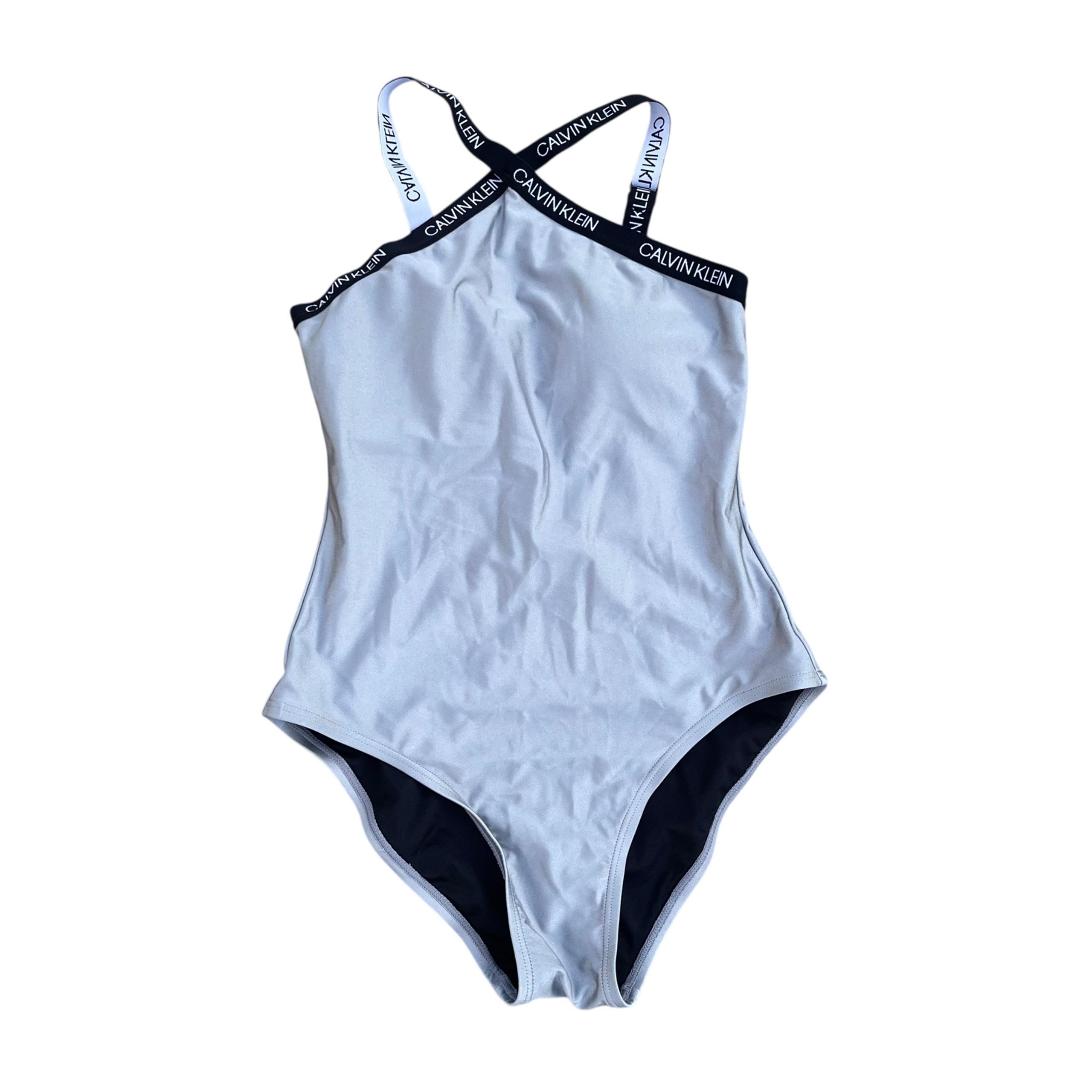Calvin Klein Women’s Sliver Logo One Piece Open Back Swimsuit