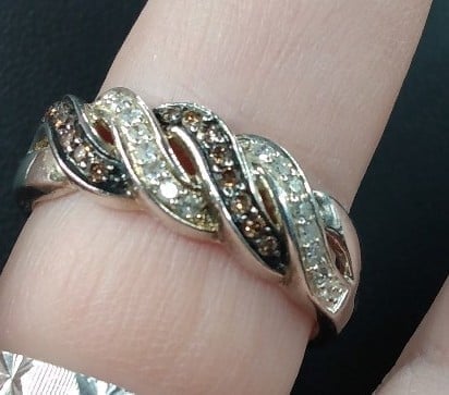 Sterling silver diamond & brown diamond twist Ring. Size 10