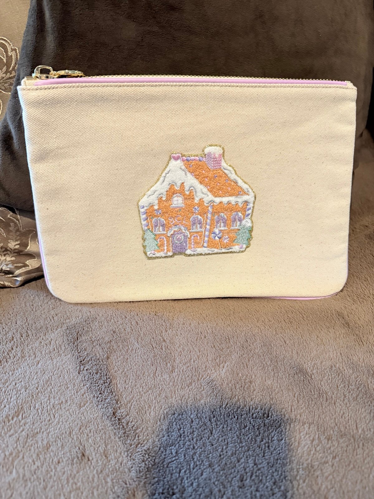 EUC Stoney clover lane canvas/grape flat pouch with gingerbread patch stuck on.