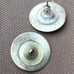 Sterling silver disc earrings with tiny pearl