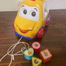 Rhymes and sorter car for toddler. Spanish language toy.