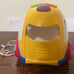 Rhymes and sorter car for toddler. Spanish language toy.