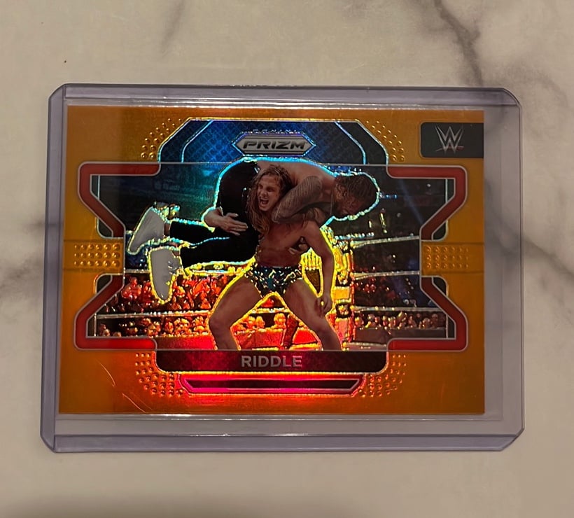 Riddle Orange /99 2022 Panini WWE Prizm