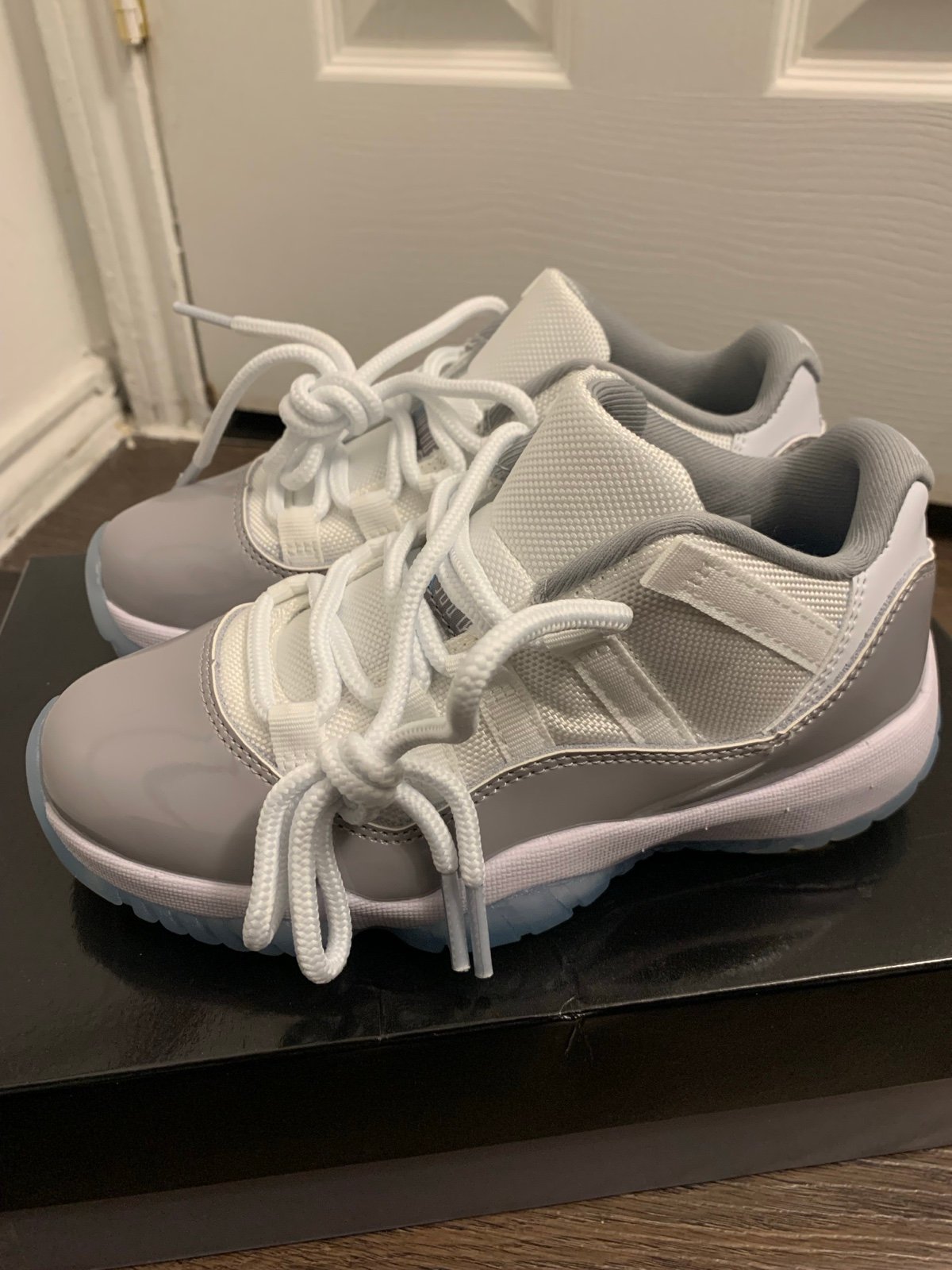Jordan 11 low cement grey