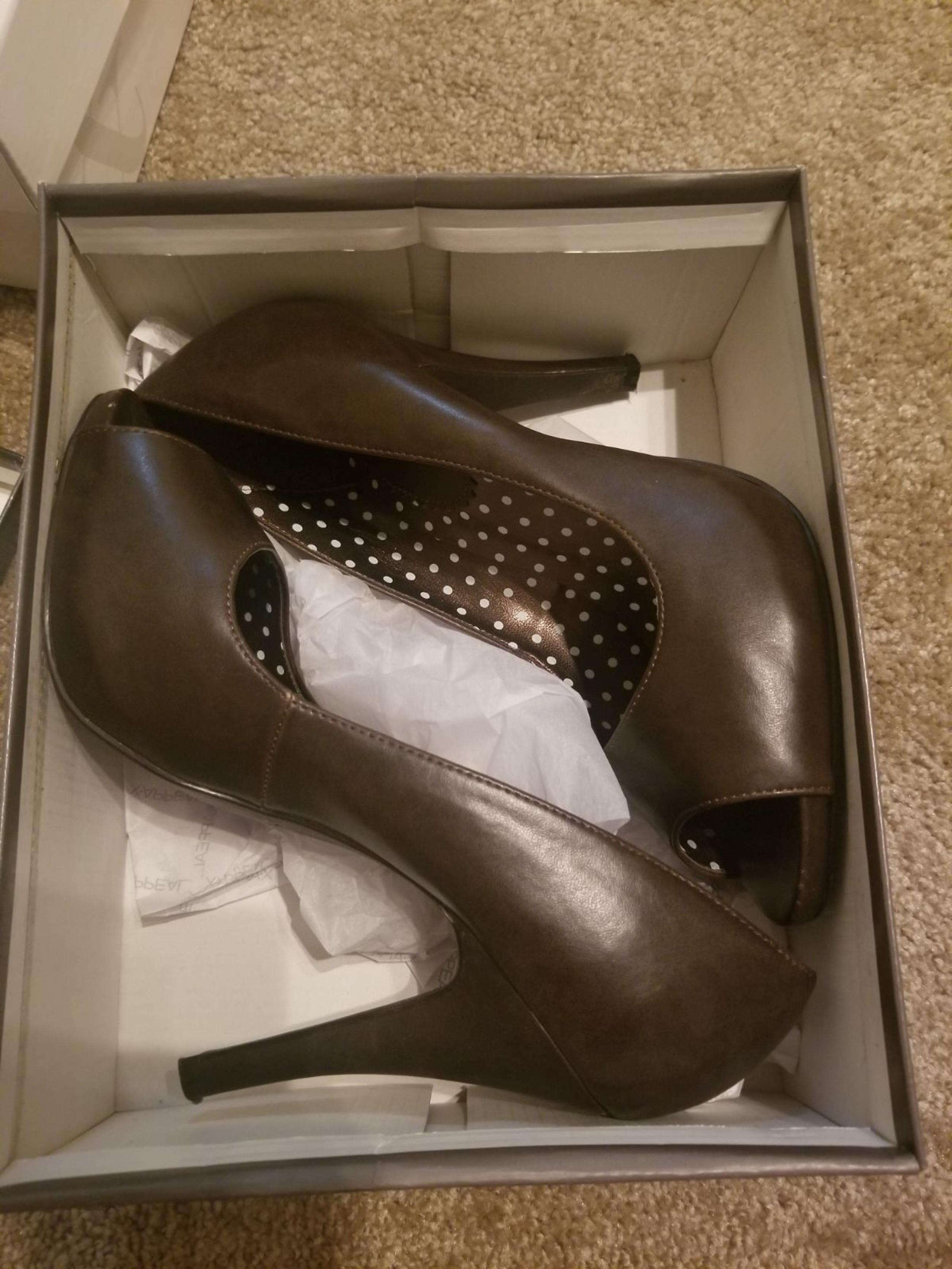 Brown peep toe pumps