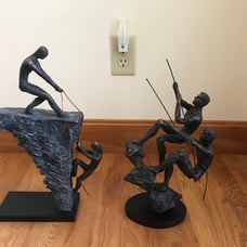 Two Two Mountain Climbers Sculptures
