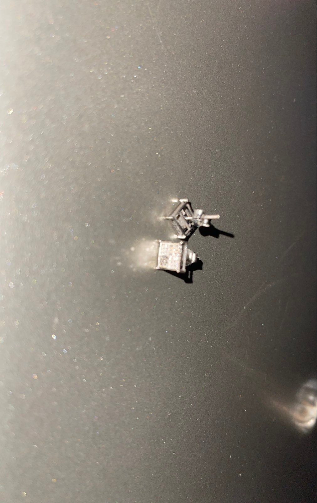 Screw on diamond earrings