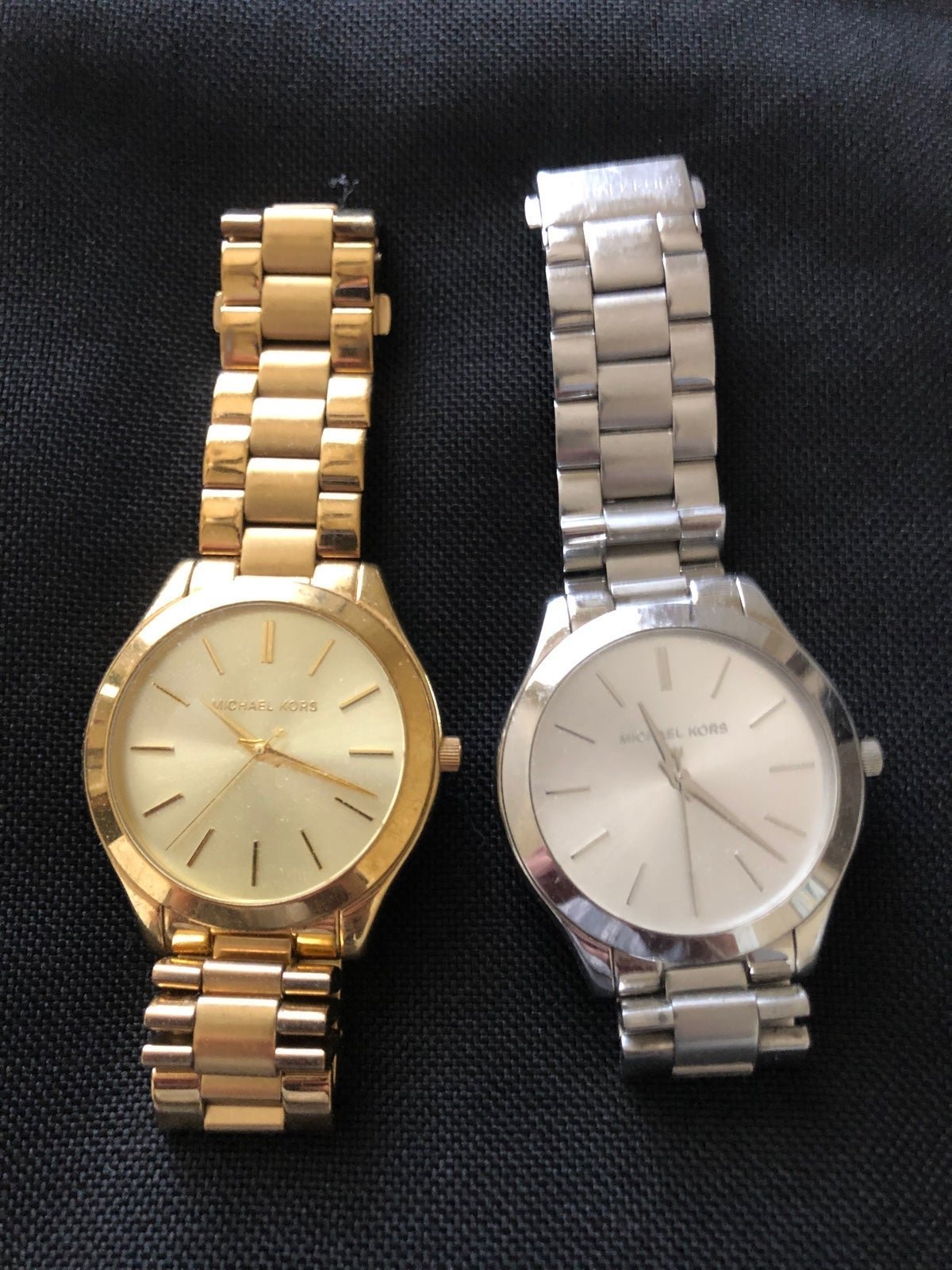 Michael Kors Watch slim runway gold and silver Both watches included.