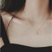 The Dainty Solitaire pendant necklace in gold