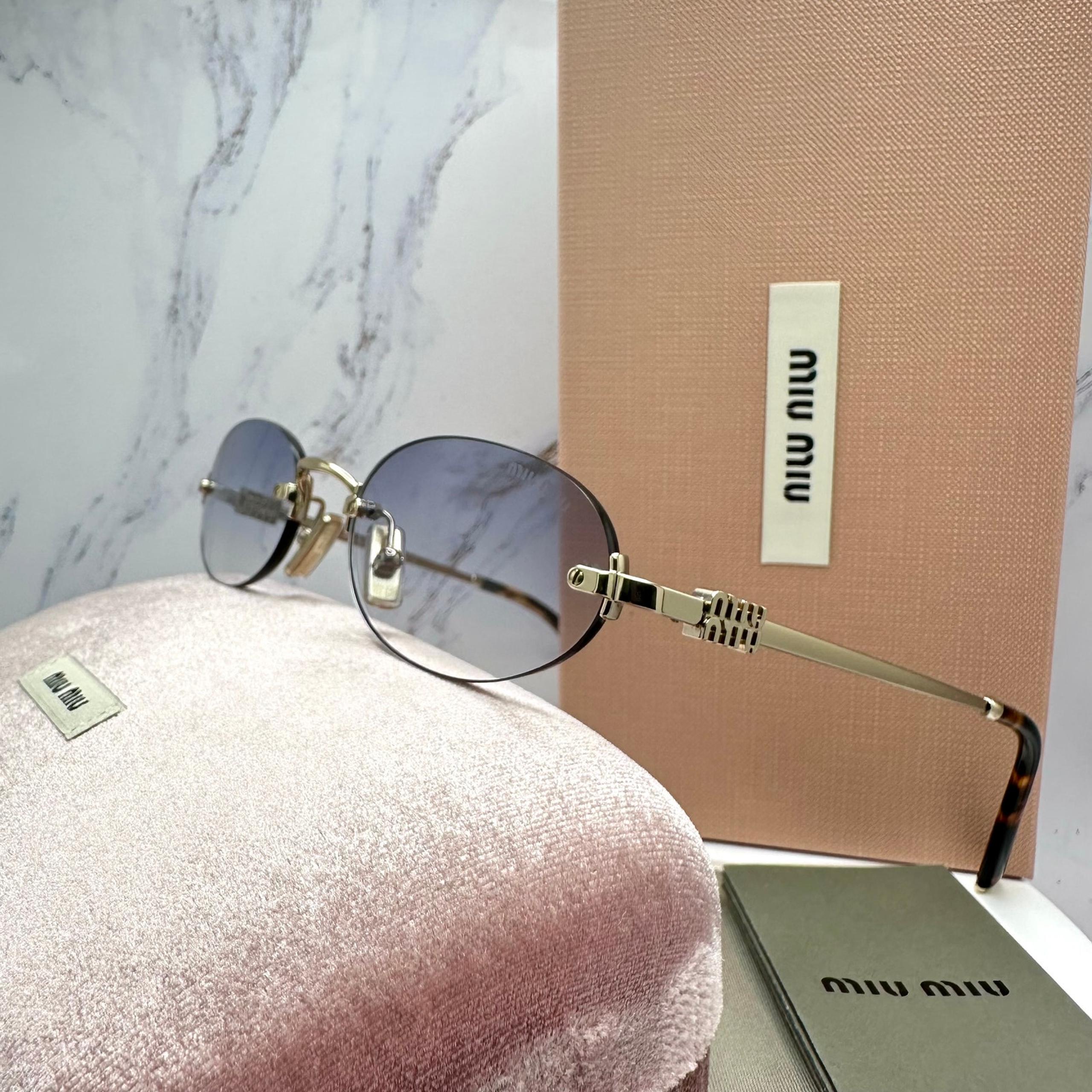 New MIU MIU Sunglasses Oval MU A54S Pale Gold Rimless Gradient Metal ZVN80O
