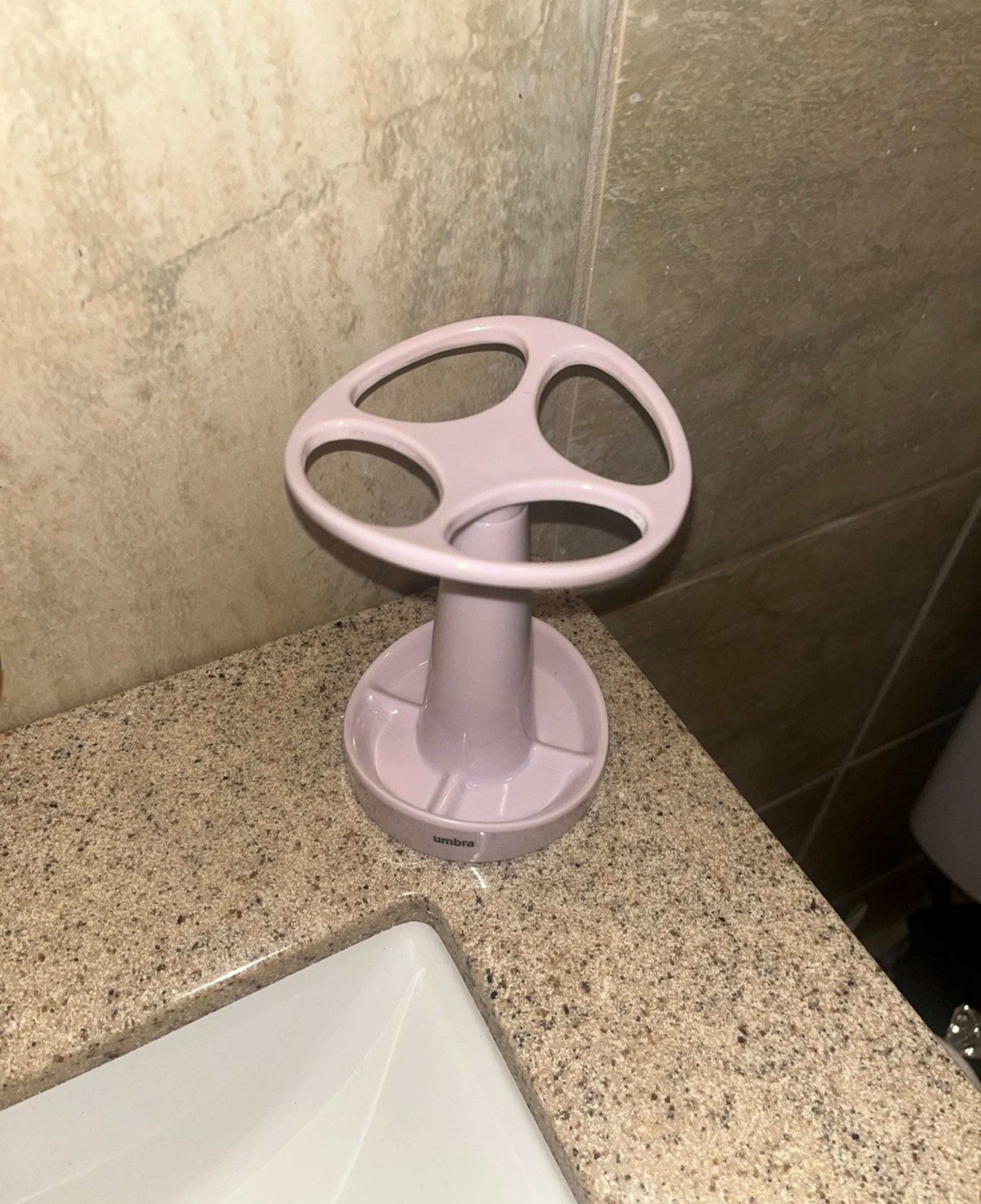 Umbra toothbrush holder