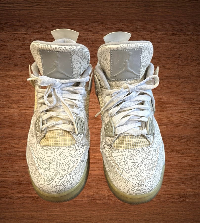 AIR JORDAN 4 RETRO “30 ANNIVERSARY LASER. SNEAKER FEATURING A WHITE LEATHER UPPE