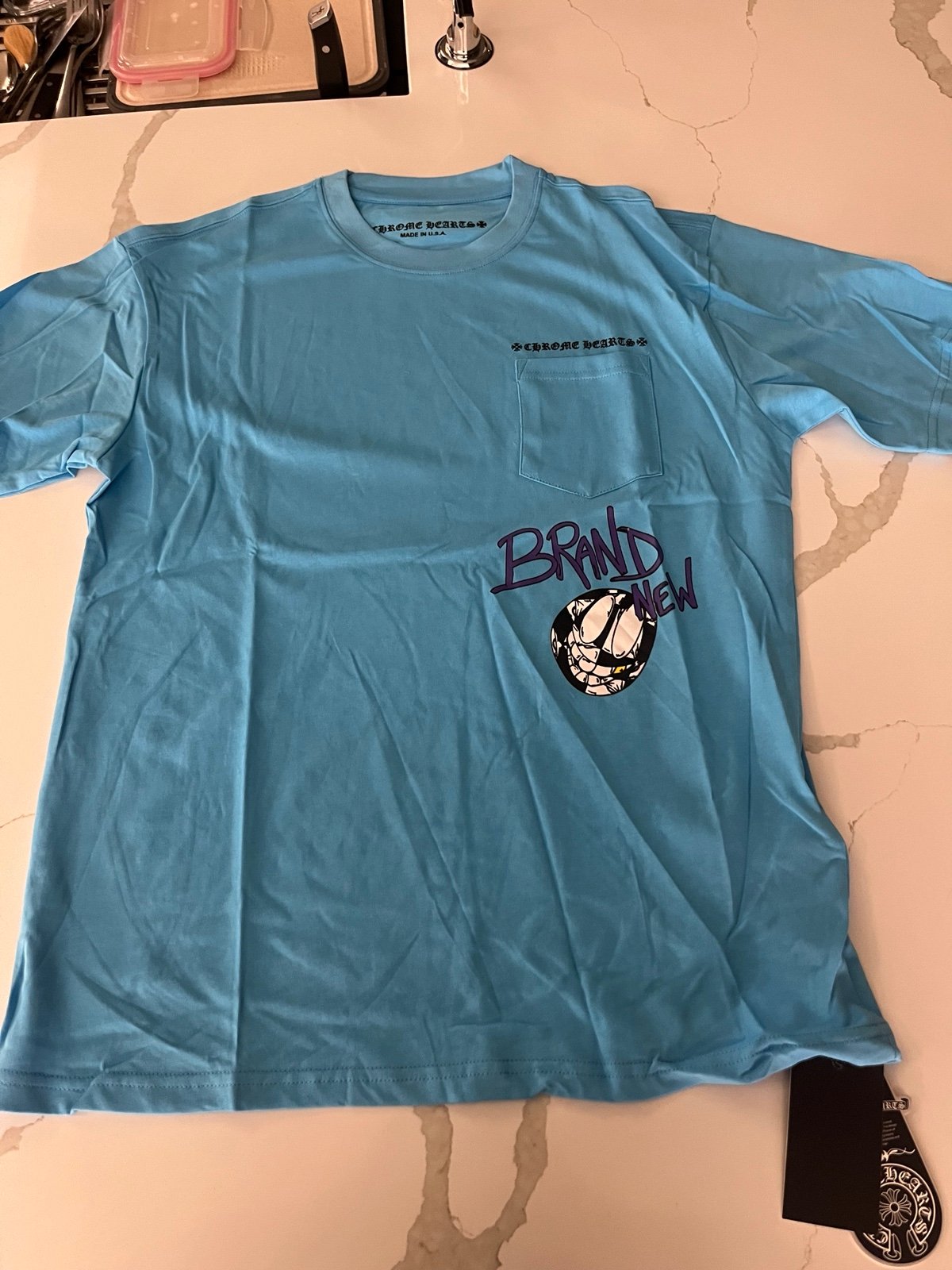 Blue chrome tee