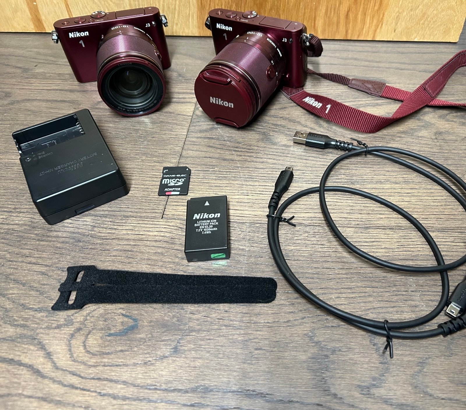 2 Red Nikon 1 J3 Cameras W/10-100mm Lens Plus SD Card,Data Cables,Charger (1Batt