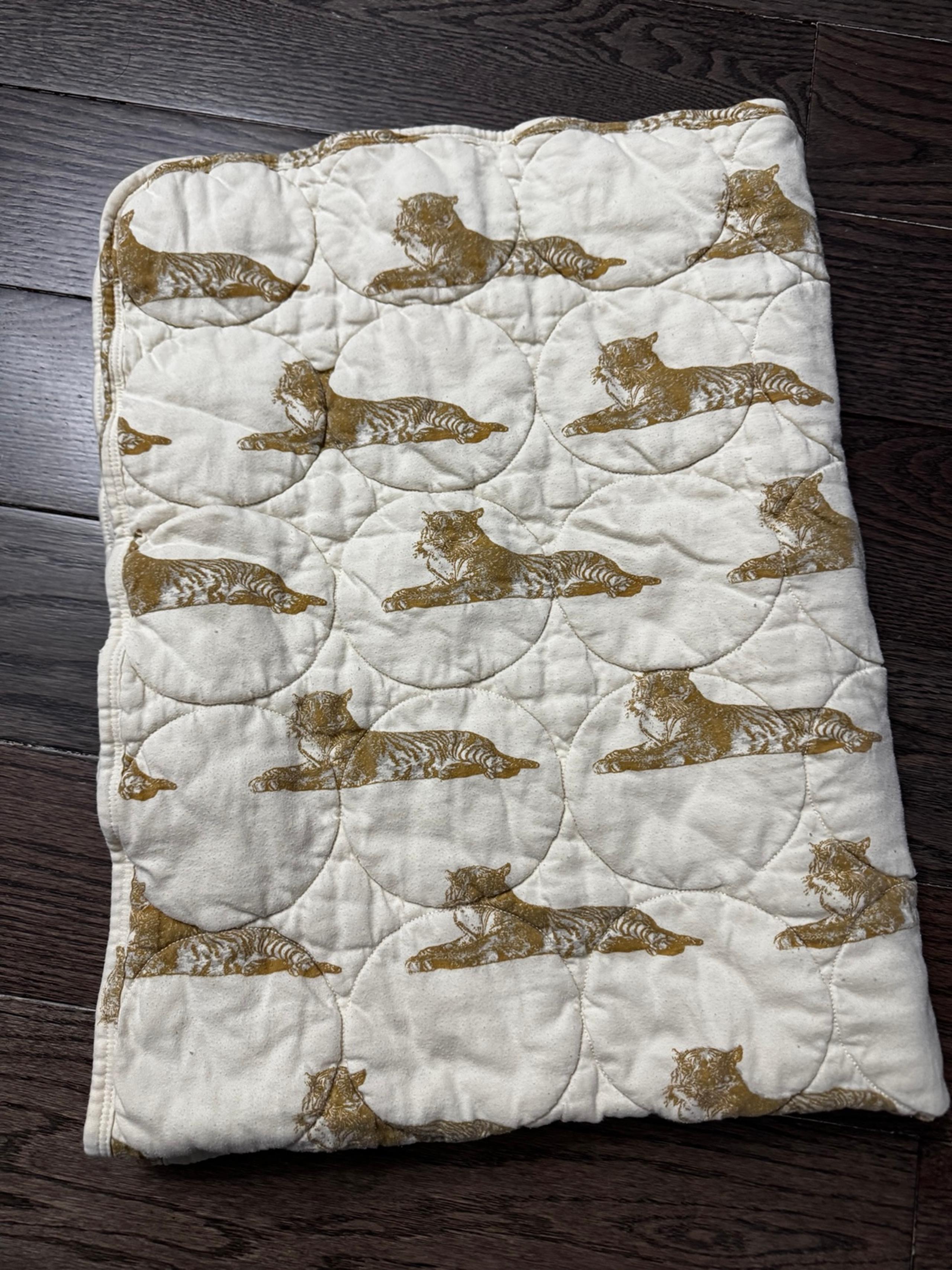 Kate Quinn tiger circle blanket