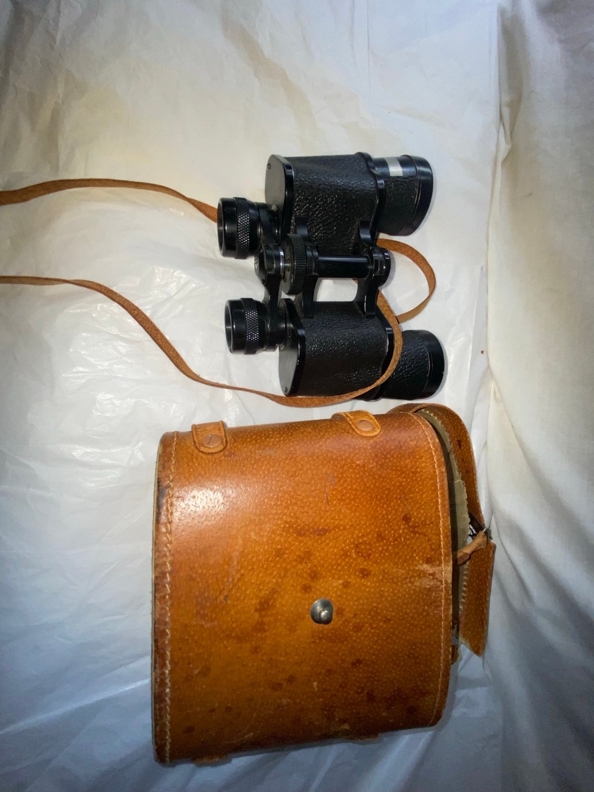 Vintage binoculars with leather case -